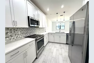 7509 Carnegie Way, Naples, FL 34119 - Photo 3