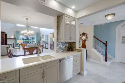 11594 Quail Village Way, Naples, FL 34119 - Photo 19