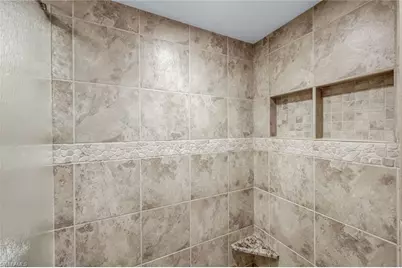 11594 Quail Village Way, Naples, FL 34119 - Photo 23