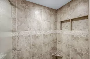 11594 Quail Village Way, Naples, FL 34119 - Photo 23