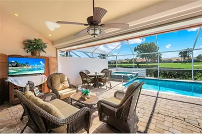 11594 Quail Village Way, Naples, FL 34119 - Photo 9