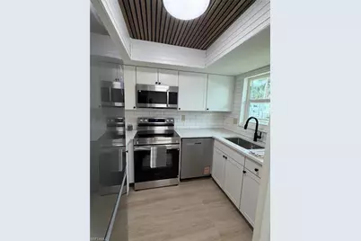 325 Charlemagne Blvd #A101, Naples, FL 34112 - Photo 1