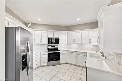 24480 Reserve Ct #103, Bonita Springs, FL 34134 - Photo 15
