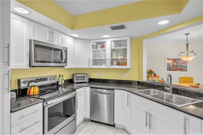 601 Beachwalk Cir #101, Naples, FL 34108 - Photo 9