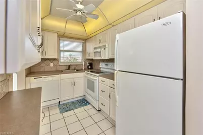 175 Turtle Lake Ct #210, Naples, FL 34105 - Photo 7