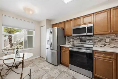 6670 Huntington Lakes Cir #104, Naples, FL 34119 - Photo 1
