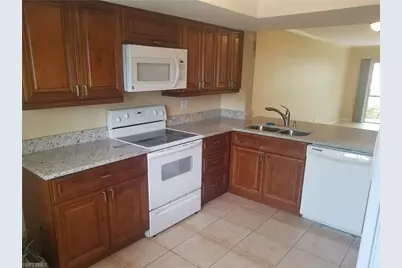 5697 Rattlesnake Hammock Rd #101C, Naples, FL 34113 - Photo 7
