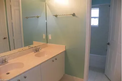 1400 Mariposa Cir #104, Naples, FL 34105 - Photo 13