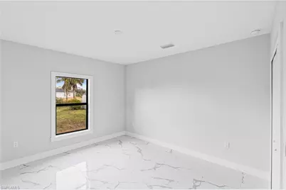 556 Woodview Dr, Lehigh Acres, FL 33972 - Photo 19