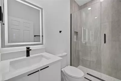 392 Charwood Ave S, Lehigh Acres, FL 33974 - Photo 27