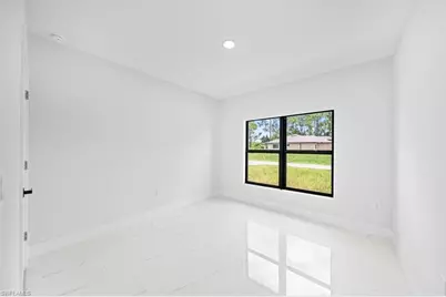 2505 1st St SW, Lehigh Acres, FL 33976 - Photo 13