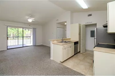 2214 Arbour Walk Cir #2026, Naples, FL 34109 - Photo 17