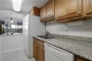 11 Bluebill Ave, Naples, FL 34103 - Photo 9
