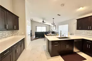 9808 Gladiolus Bulb Loop, Fort Myers, FL 33908 - Photo 5