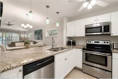 5700 Woodmere Lake Cir #E201, Naples, FL 34112 - Photo 3