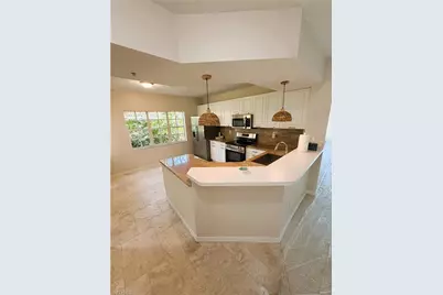 7518 Silver Trumpet Ln #101, Naples, FL 34109 - Photo 9
