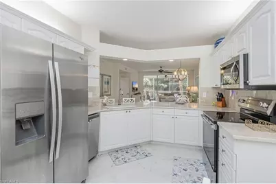 7693 Pebble Creek Cir #104, Naples, FL 34108 - Photo 9