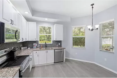 1425 Mariposa Cir #101, Naples, FL 34105 - Photo 15