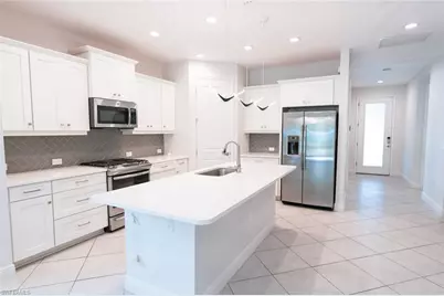2309 Ariane Dr, Naples, FL 34112 - Photo 9