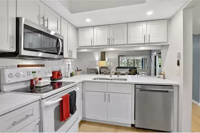 5857 Rattlesnake Hammock Rd N #106, Naples, FL 34113 - Photo 1