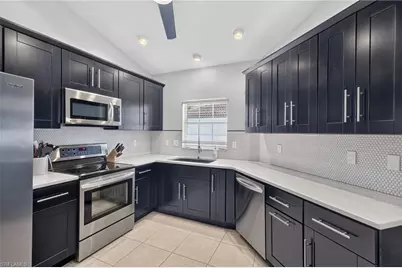11071 Linnet Ln, Naples, FL 34119 - Photo 11