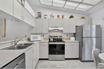 4210 Looking Glass Ln #4210, Naples, FL 34112 - Photo 11