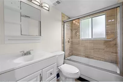7725 Jewel Ln #104, Naples, FL 34109 - Photo 9