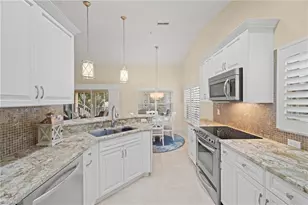 24833 Lakemont Cove Ln, Bonita Springs, FL 34134 - Photo 9