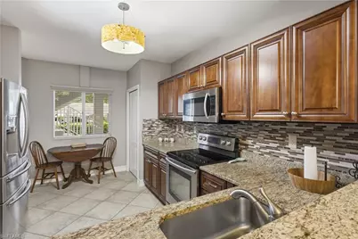 7822 Great Heron Way #106, Naples, FL 34104 - Photo 5