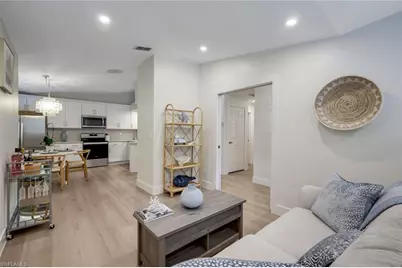 2450 Old Groves Rd #201, Naples, FL 34109 - Photo 11