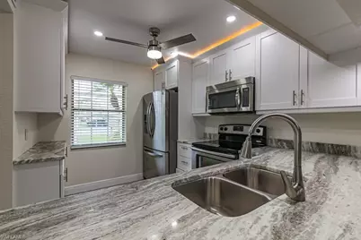 2562 Kings Lake Blvd #102, Naples, FL 34112 - Photo 9