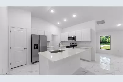 1051 Sentinela Blvd, Lehigh Acres, FL 33974 - Photo 9