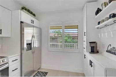 1025 Foxfire Ln #303, Naples, FL 34104 - Photo 21