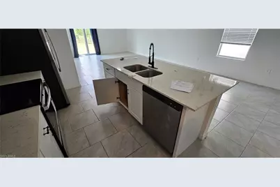 20111 Caroline Creek Pl, Lehigh Acres, FL 33974 - Photo 15