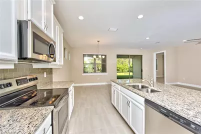 16354 Barclay Ct, Naples, FL 34110 - Photo 9