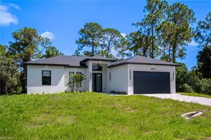 1015 Bagget St E, Lehigh Acres, FL 33974 - Photo 1