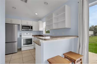 3890 68th Ave NE, Naples, FL 34120 - Photo 7