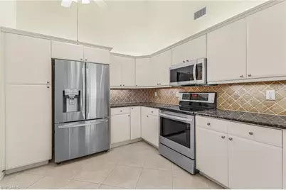 14994 Sterling Oaks Dr, Naples, FL 34110 - Photo 9