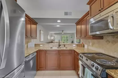 145 Robin Hood Cir #104, Naples, FL 34104 - Photo 7