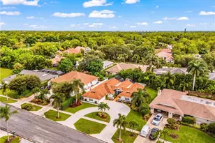 2472 Pinewoods Cir, Naples, FL 34105 - Photo 25