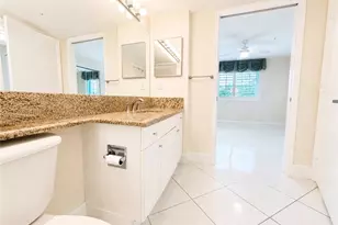 1265 Wildwood Lakes Blvd, Naples, FL 34104 - Photo 9