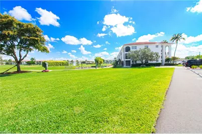 41 High Point Cir S #303, Naples, FL 34103 - Photo 1
