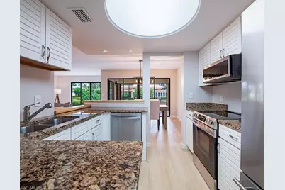 6710 Pelican Bay Blvd #412, Naples, FL 34108 - Photo 5