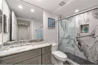 6855 Satinleaf Rd S #103, Naples, FL 34109 - Photo 11