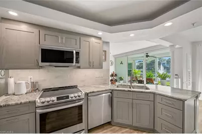 6855 Satinleaf Rd S #103, Naples, FL 34109 - Photo 7