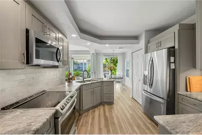 6855 Satinleaf Rd S #103, Naples, FL 34109 - Photo 9