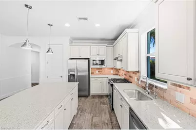 10647 Tiki Ct, Estero, FL 33928 - Photo 9