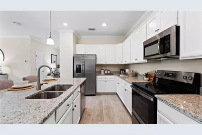 5165 Sugarwood Dr, Naples, FL 34113 - Photo 9