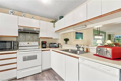 3062 Sandpiper Bay Cir #K104, Naples, FL 34112 - Photo 13