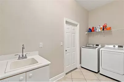1124 Augusta Falls Way, Naples, FL 34119 - Photo 19